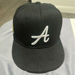 A Black Snapback Hat